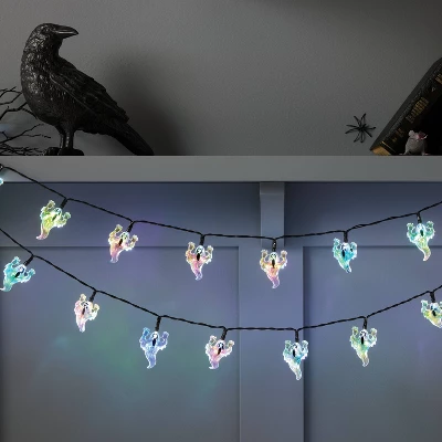 20ct LED Battery Operated Iridescent Ghost Halloween Indoor Outdoor Novelty String Lights Black/White - Hyde And EEK! Boutique™ 1 20ct LED Battery Operated Iridescent Ghost Halloween Indoor Outdoor Novelty String Lights Black/White - Hyde And EEK! Boutique™