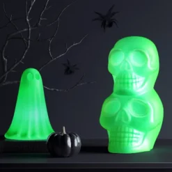Plastic Blacklight Glow Stacked Skulls Figurine - Hyde And EEK! Boutique™ Neon Green